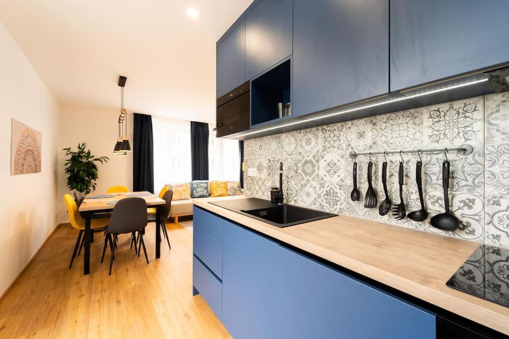 Kuchyň nebo kuchyňský kout v ubytování Family Apartment Grohova