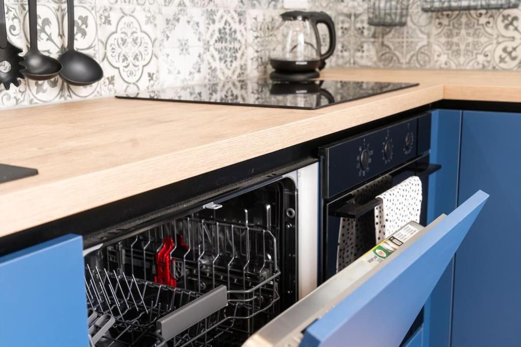 Kuchyň nebo kuchyňský kout v ubytování Family Apartment Grohova