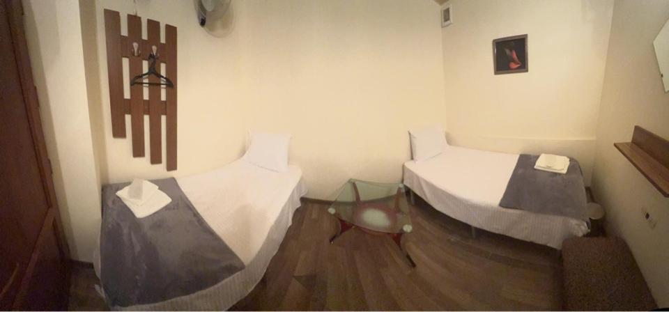 Postel nebo postele na pokoji v ubytování ENIGMA HOSTEL