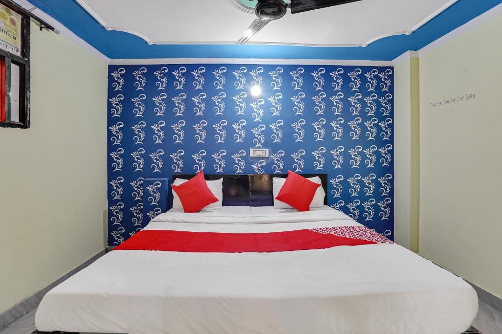 מיטה או מיטות בחדר ב-Flagship Baba Guest House