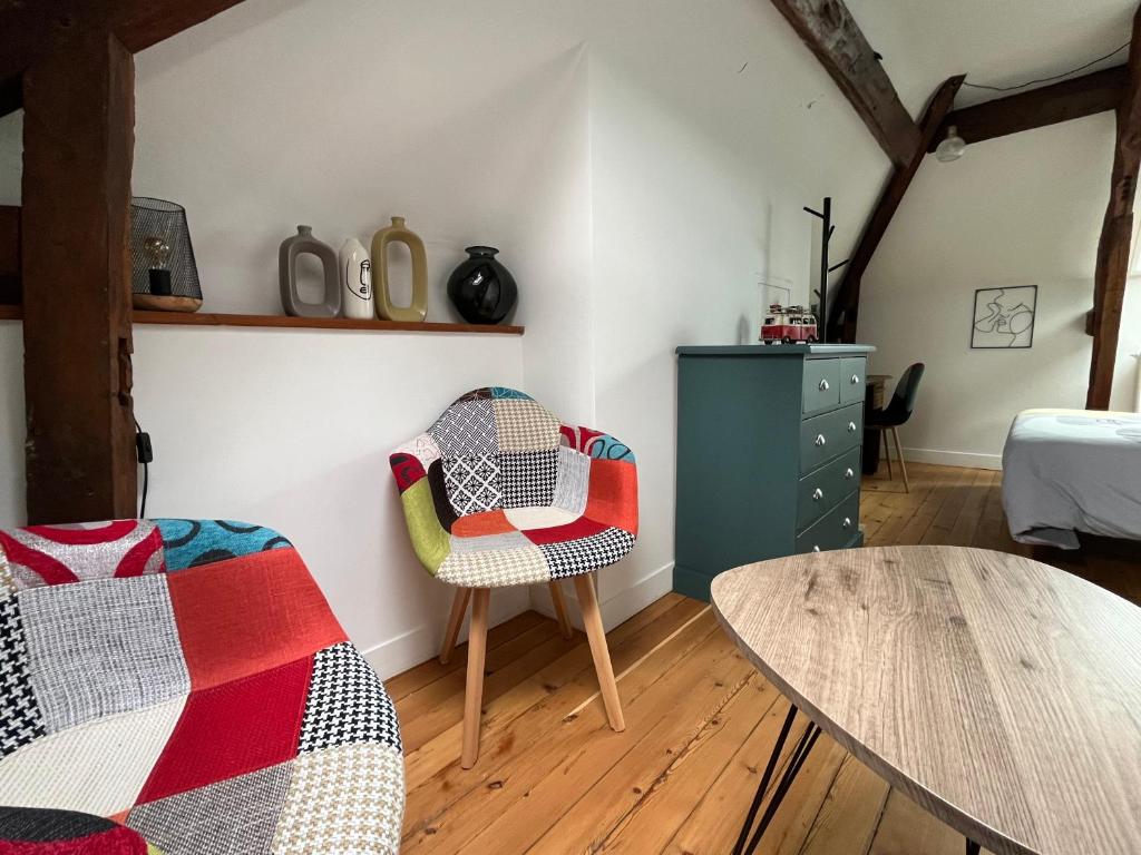 Postel nebo postele na pokoji v ubytování Clos Sanouva, Fougère