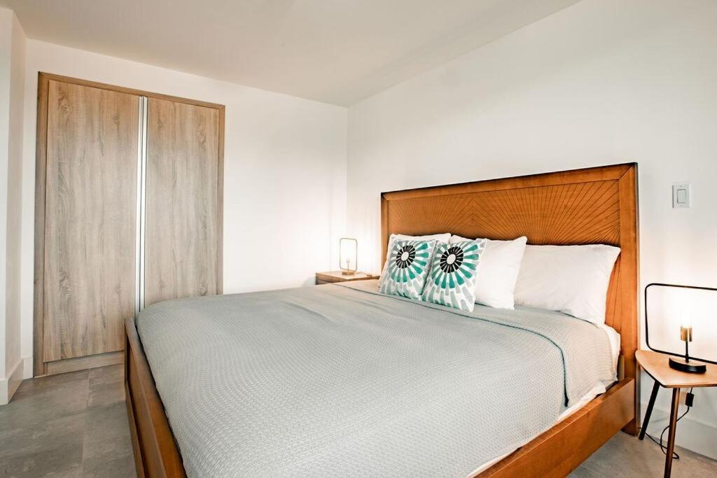 Postel nebo postele na pokoji v ubytování Blue Venao CONDO APARTMENT C21