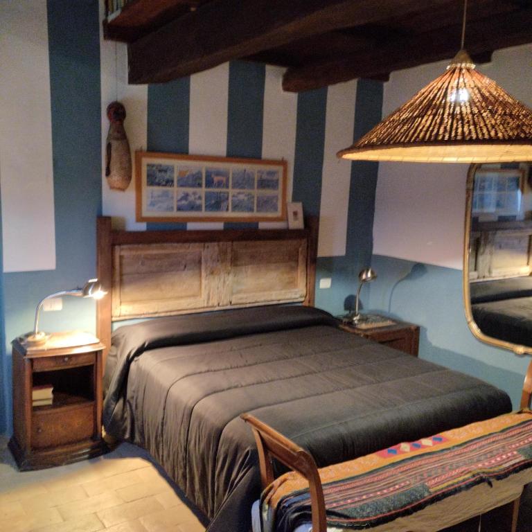 Posteľ alebo postele v izbe v ubytovaní Casa del Piano