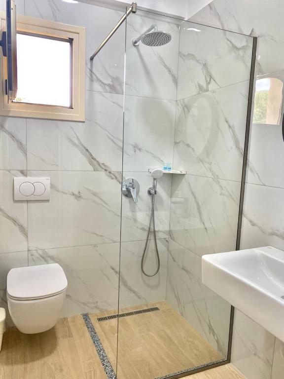 Koupelna v ubytování Foti Rooms