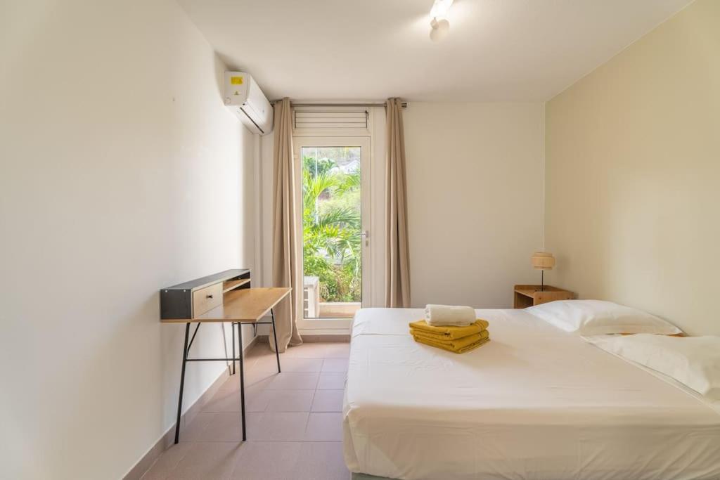 Postel nebo postele na pokoji v ubytování Appartement Macaron Clair