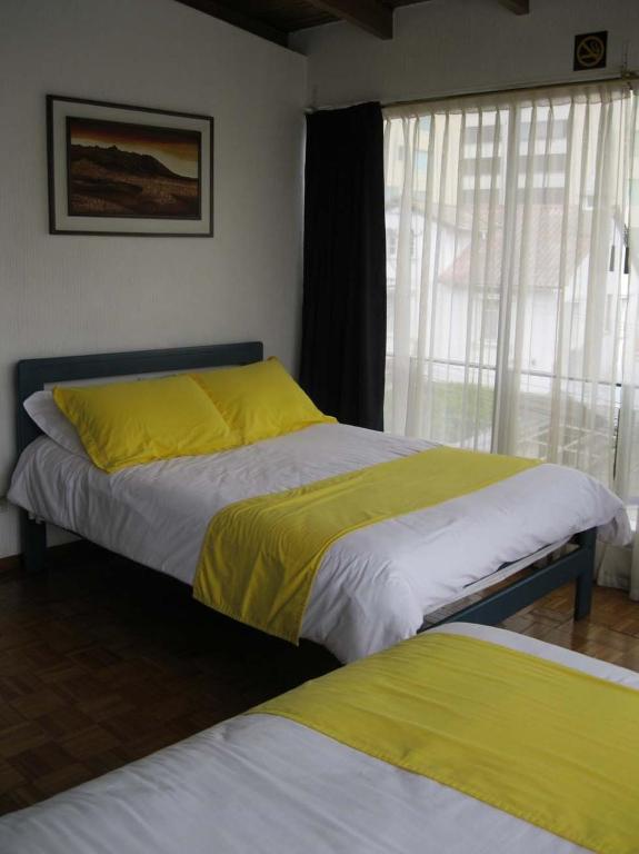 Postel nebo postele na pokoji v ubytování Hotel Rincón Escandinavo