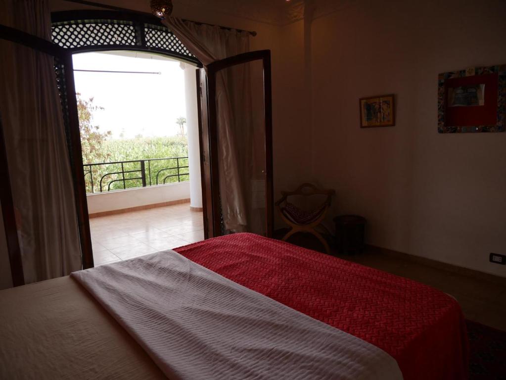 Postel nebo postele na pokoji v ubytování Villa Quiet Place