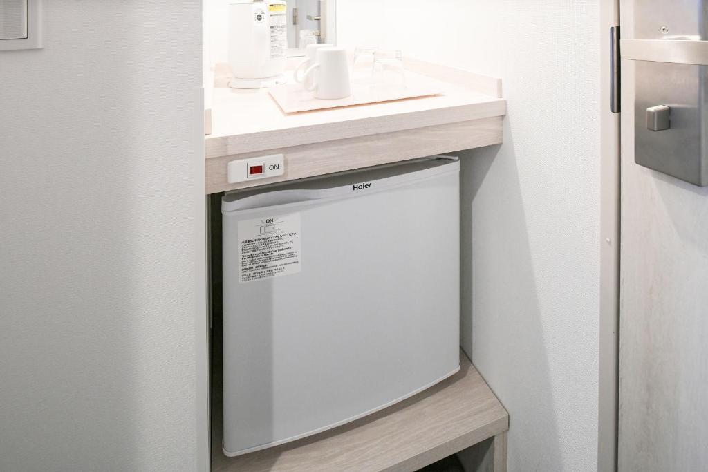 Kuchyň nebo kuchyňský kout v ubytování Vessel Inn Chiba Station