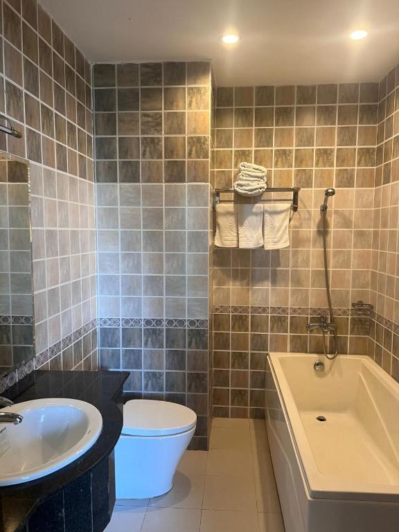 Koupelna v ubytování Madella Hotel