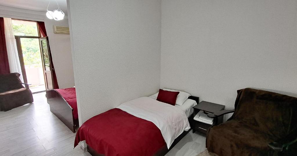 Postel nebo postele na pokoji v ubytování Sighnaghi Central