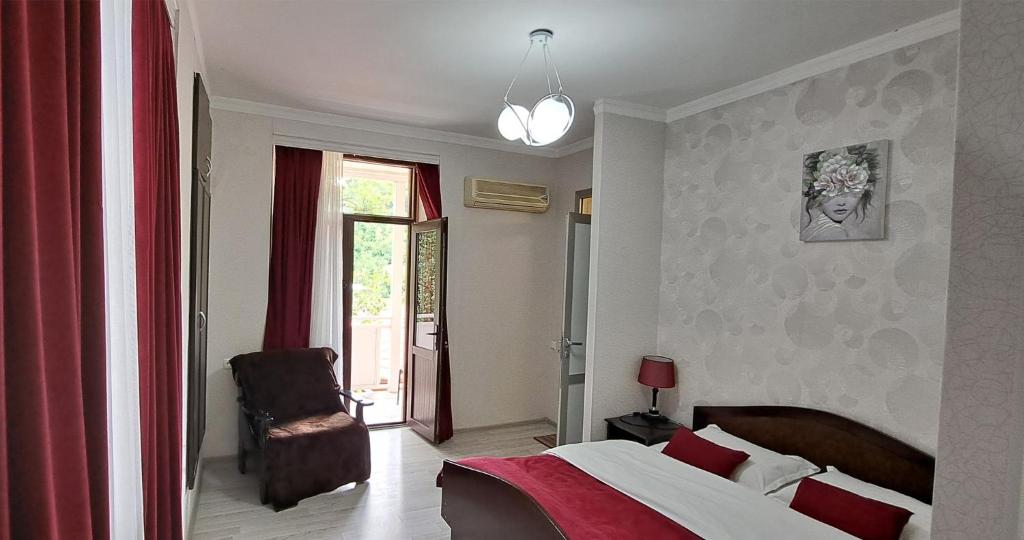 Postel nebo postele na pokoji v ubytování Sighnaghi Central