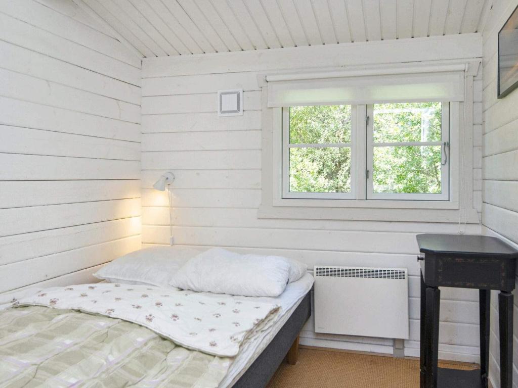 Postel nebo postele na pokoji v ubytování Holiday home Fanø LII