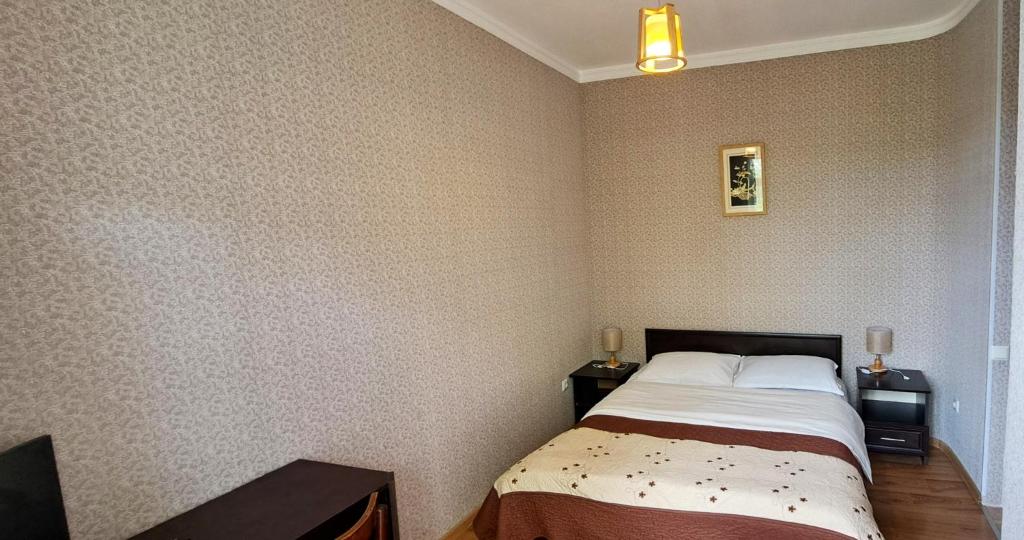 Postel nebo postele na pokoji v ubytování Sighnaghi Central