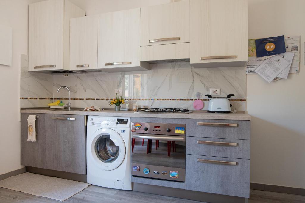 Kuchyň nebo kuchyňský kout v ubytování Casadelfino