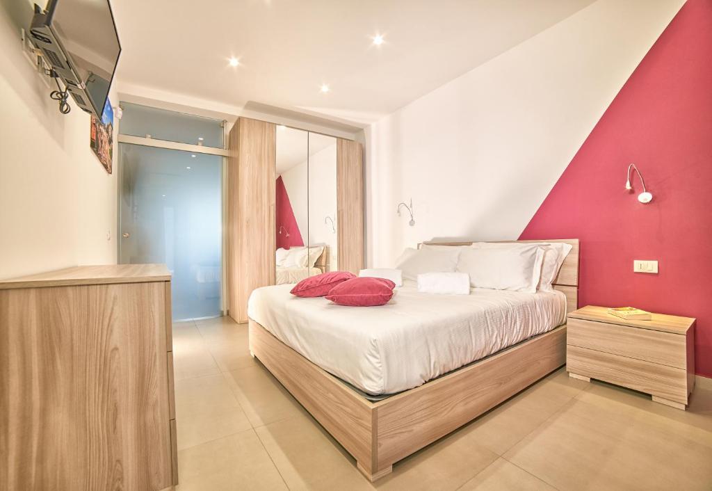 A bed or beds in a room at Il Casale di Monacella