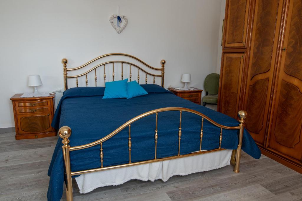 Postel nebo postele na pokoji v ubytování Casadelfino