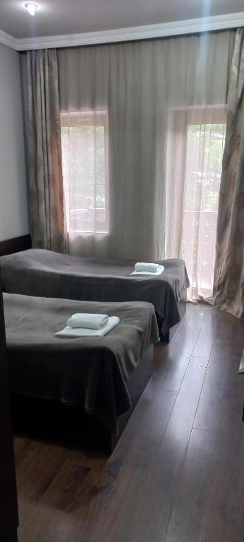 Postel nebo postele na pokoji v ubytování Guesthouse Mestia 32