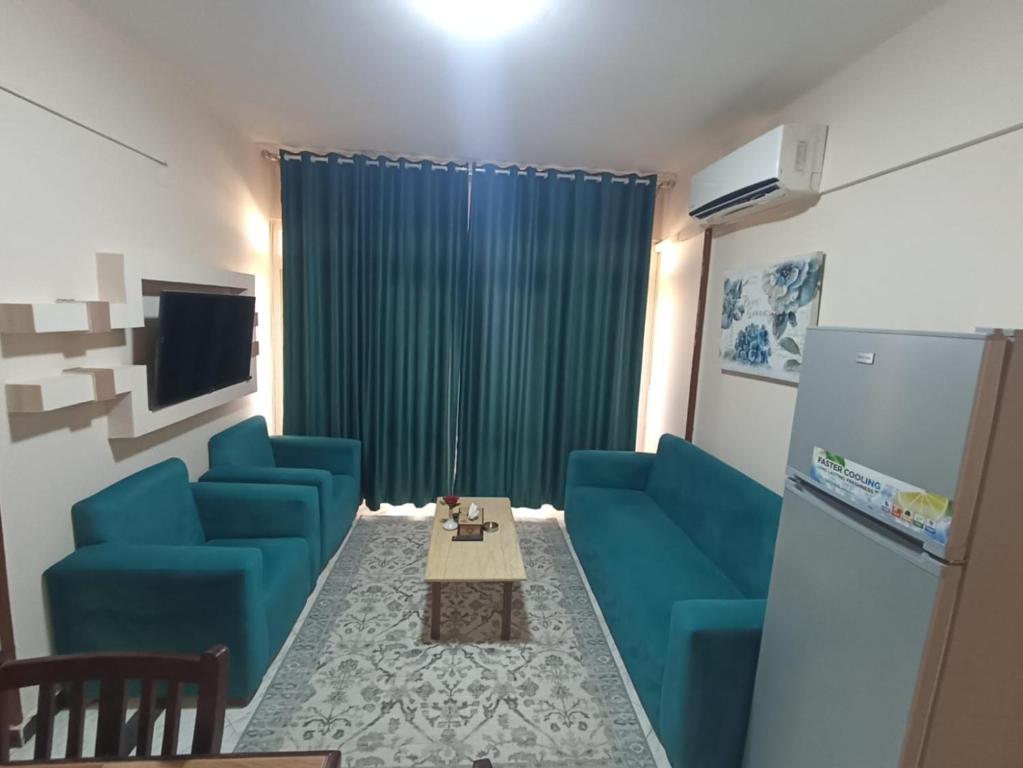 Posezení v ubytování El Obayed Apartments Armed Forces