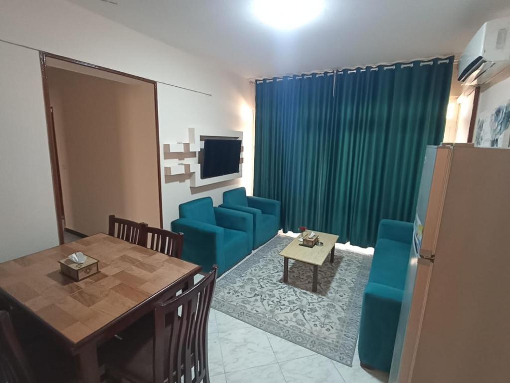 TV a/nebo společenská místnost v ubytování El Obayed Apartments Armed Forces