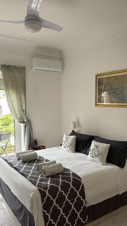 Postel nebo postele na pokoji v ubytování casa Ricciulella