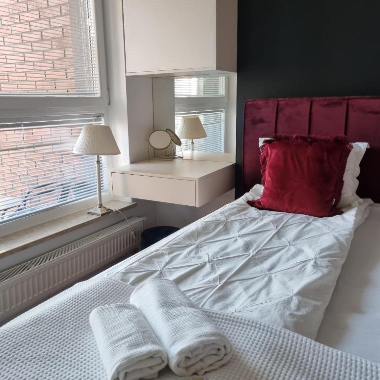 Posteľ alebo postele v izbe v ubytovaní Bastion Wałowa Apartament Śródmieście centrum Gdansk