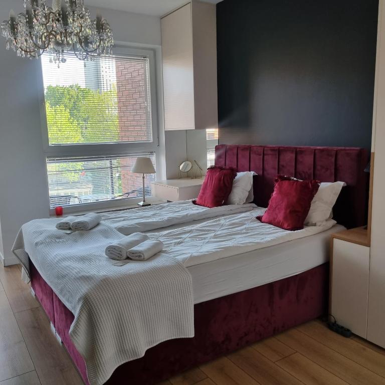 Posteľ alebo postele v izbe v ubytovaní Bastion Wałowa Apartament Śródmieście centrum Gdansk
