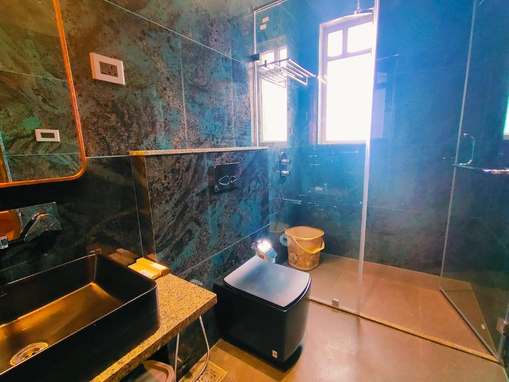 Koupelna v ubytování Hotel Akshay Palace Ahmednagar