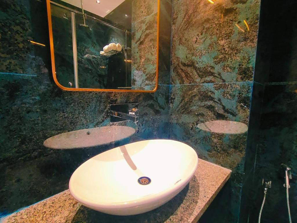 Koupelna v ubytování Hotel Akshay Palace Ahmednagar