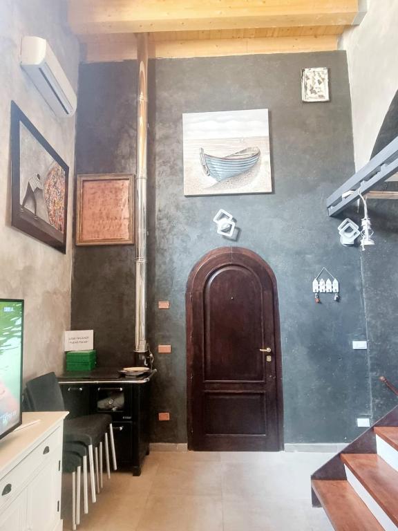 Telewizja i/lub zestaw kina domowego w obiekcie Casa vacanza in lipari ,PIANO PIANO