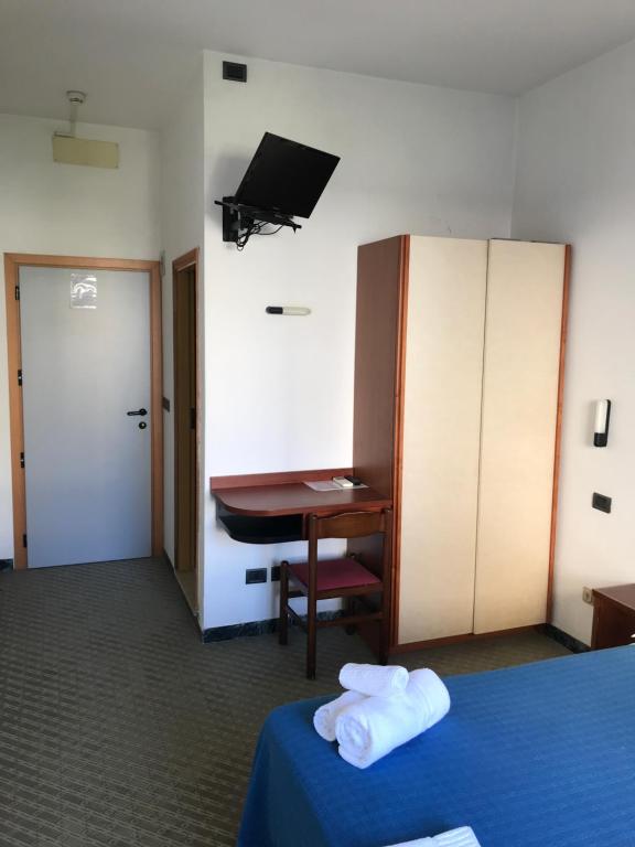 Postel nebo postele na pokoji v ubytování Hotel L&V