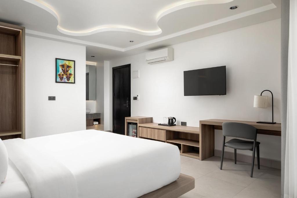 TV a/nebo společenská místnost v ubytování Chaiya Palace Hotel