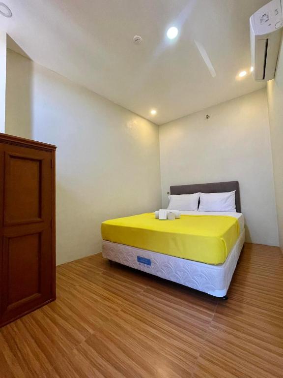 Postel nebo postele na pokoji v ubytování Hotel Elegant La Union