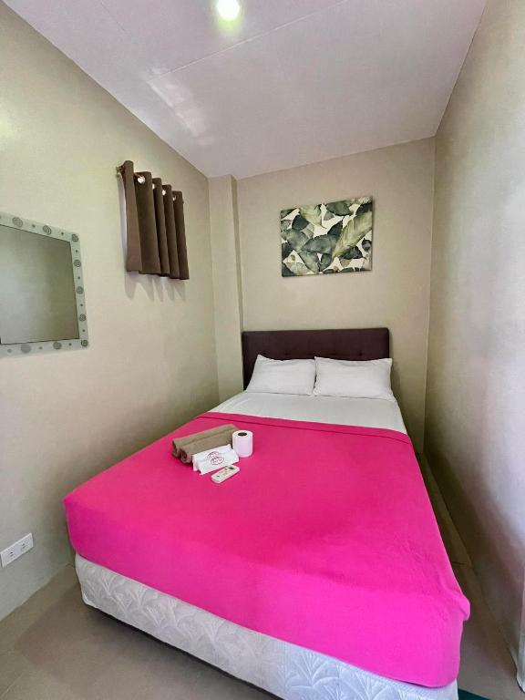 Postel nebo postele na pokoji v ubytování Hotel Elegant La Union