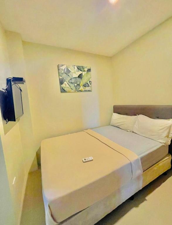 Postel nebo postele na pokoji v ubytování Hotel Elegant La Union