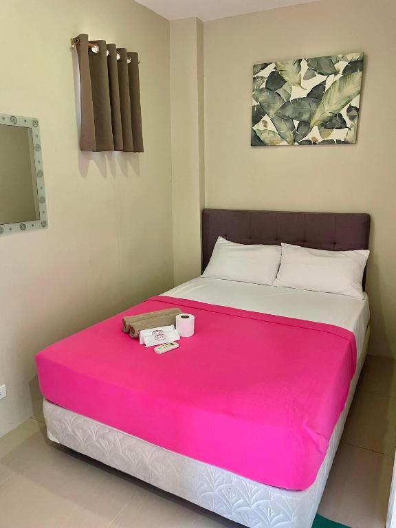 Postel nebo postele na pokoji v ubytování Hotel Elegant La Union