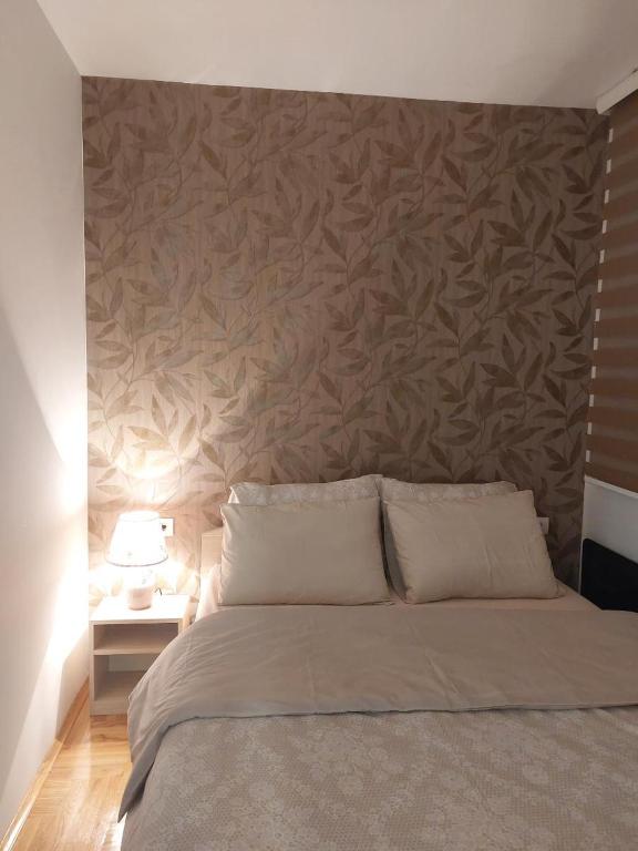 Postel nebo postele na pokoji v ubytování Apartman Loly Zlatibor