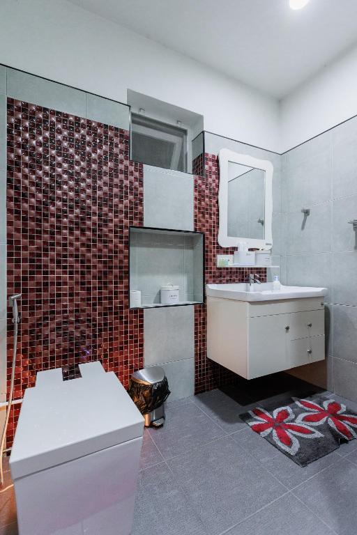 Koupelna v ubytování บ้านกันเอง Baan Kun Aeng Homestay