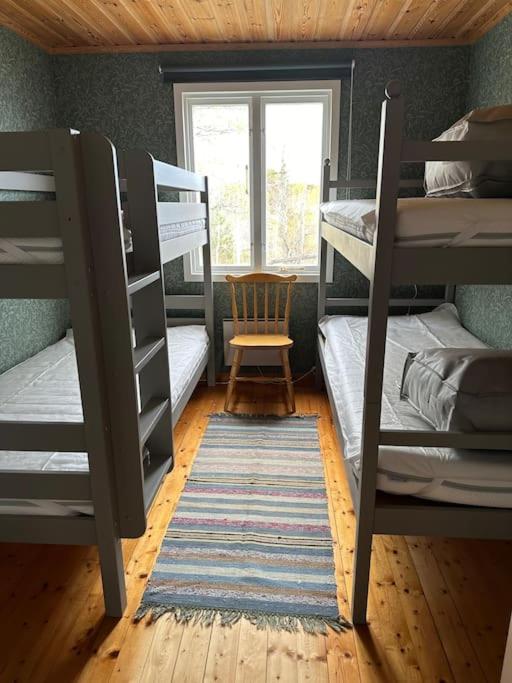 Postel nebo postele na pokoji v ubytování Stuga på Möja-en skärgårdspärla i Kyrkviken