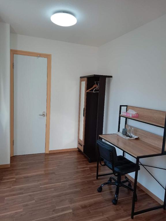 Postel nebo postele na pokoji v ubytování sakurayuki