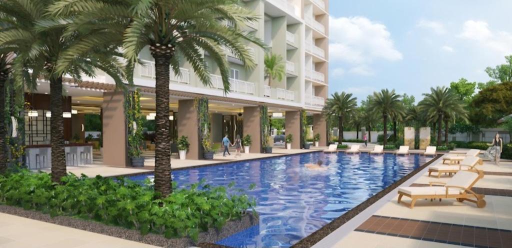 a rendering of a hotel swimming pool with palm trees at Casa Concha by Celandine in Manila