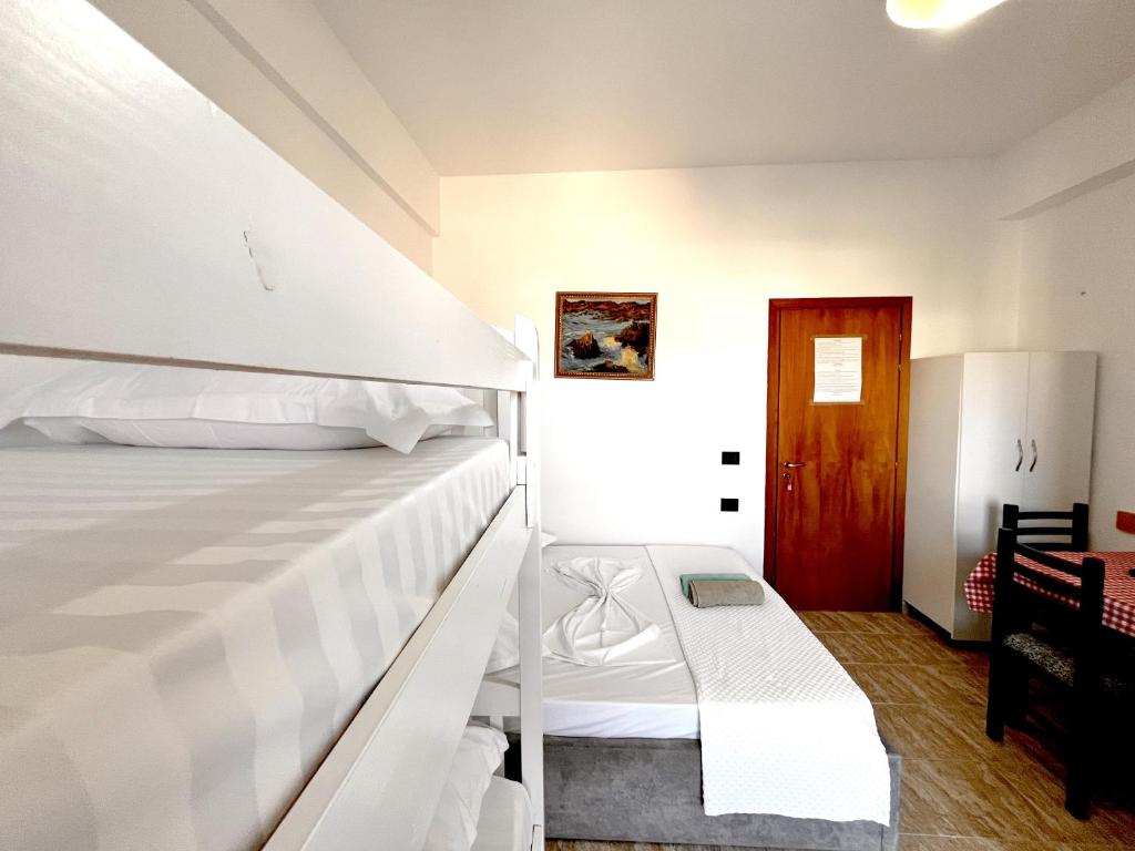Postel nebo postele na pokoji v ubytování Vila KAM