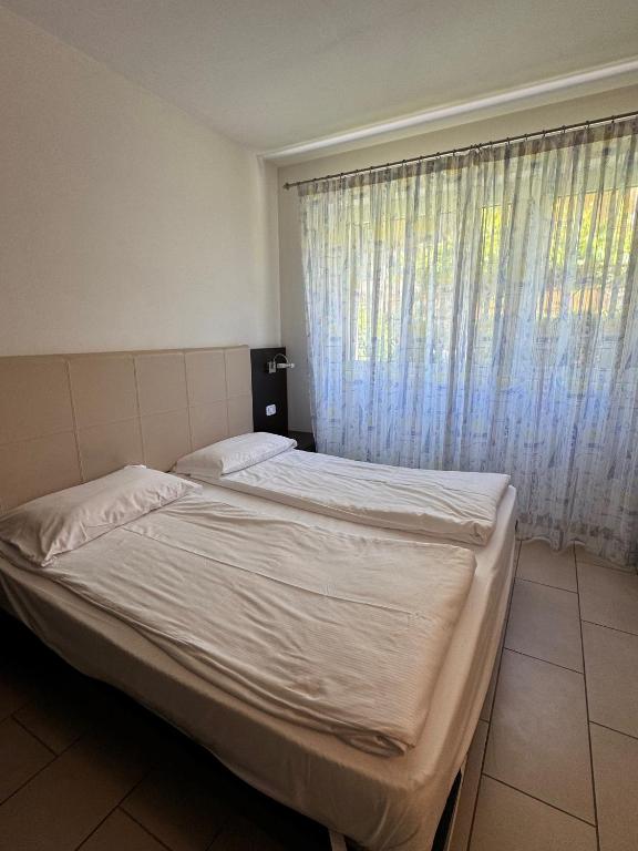 Postel nebo postele na pokoji v ubytování Casa Piccola FeWo