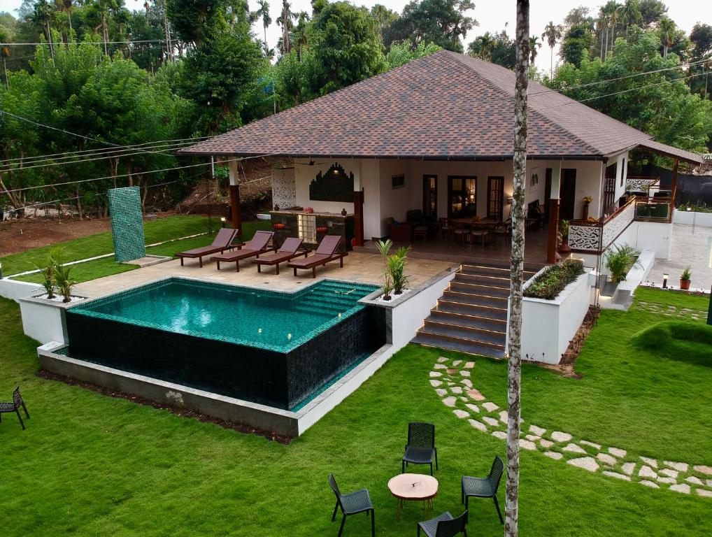 Bassein majutusasutuses Tranquil Resort - Blusalzz Collection, Wayanad - Kerala või selle lähedal