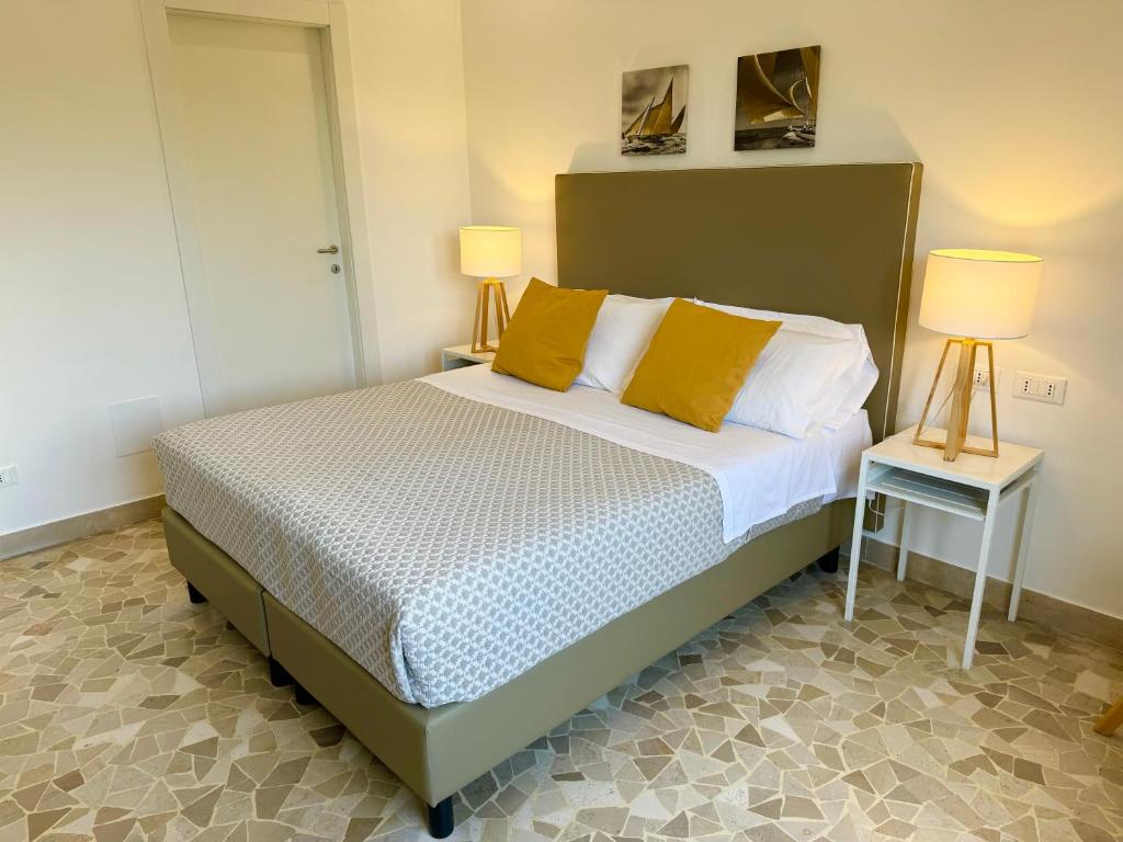 Postel nebo postele na pokoji v ubytování Villa Magnolia