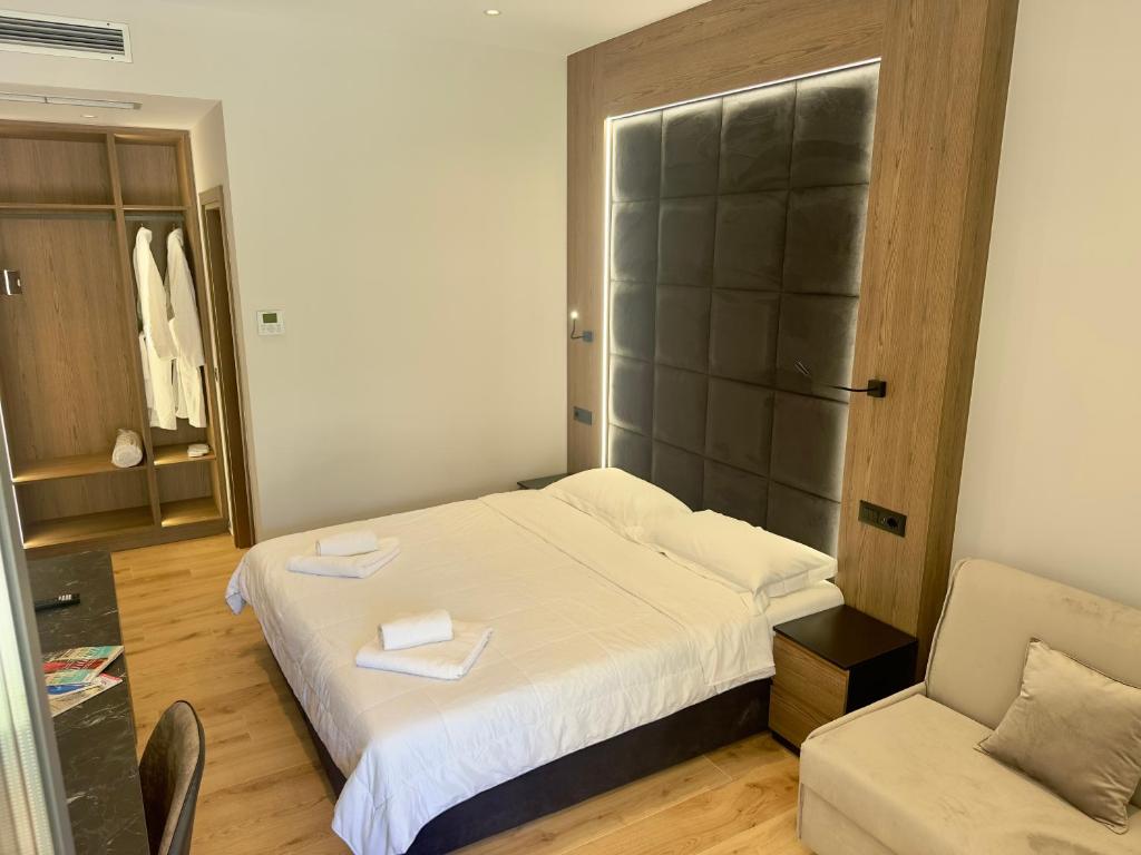 Postel nebo postele na pokoji v ubytování ELMAR COMFORT