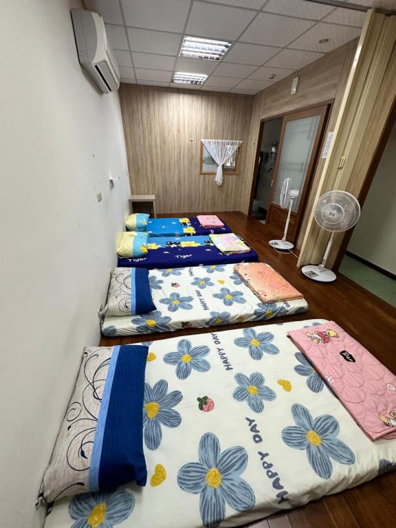 Postel nebo postele na pokoji v ubytování 枋寮枋居背包客棧Fang Ju Backpackers