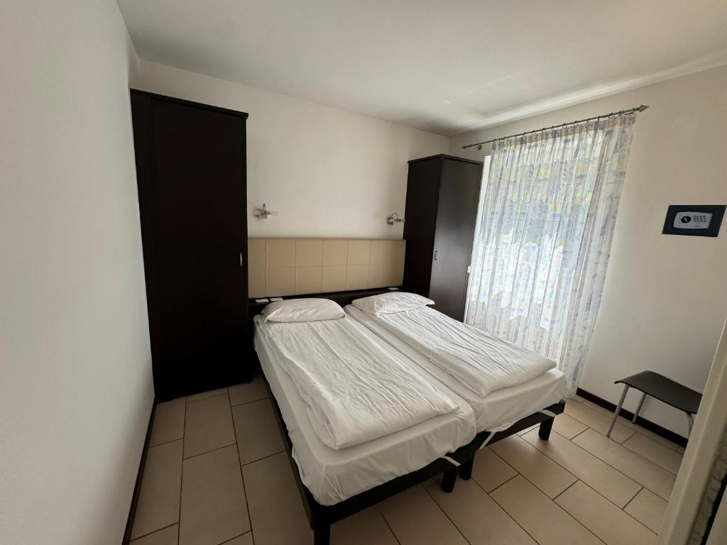 Postel nebo postele na pokoji v ubytování Casa Piccola FeWo
