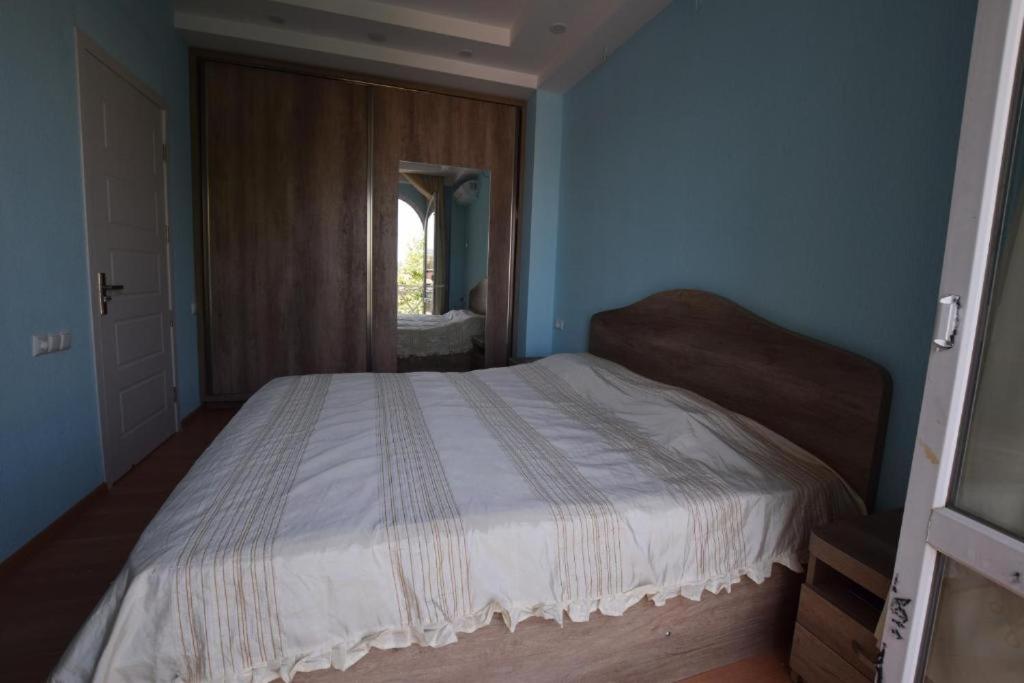 Postel nebo postele na pokoji v ubytování Rest House Tbilisi