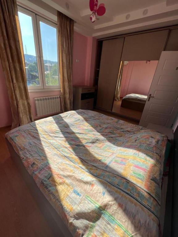 Postel nebo postele na pokoji v ubytování Rest House Tbilisi