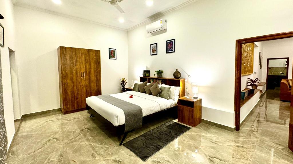 Voodi või voodid majutusasutuse Tranquil Resort - Blusalzz Collection, Wayanad - Kerala toas